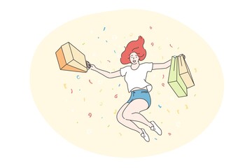 Success, shopping, purchase concept. Successful bargain and purchasing sale goods commercial discounts for customers Happy joyful woman or girl teen teenager shopaholic jumping with shop bags. 