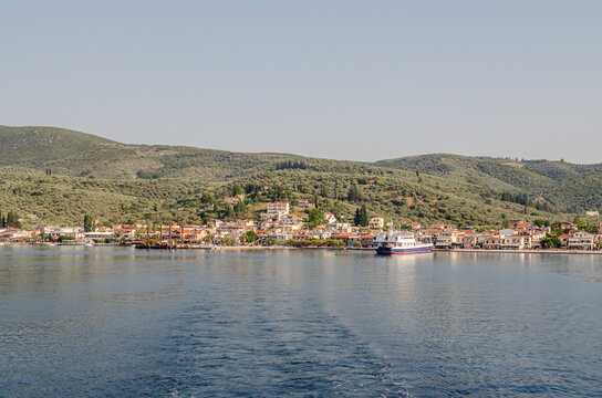 Evia island, Greece - June 28. 2020: Panorama approaching the island of Edipsos
