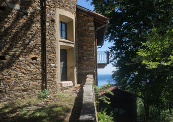 Fototapeta na wymiar rural stone house with panoramic views of Lake Maggiore.Piedmont, Italy