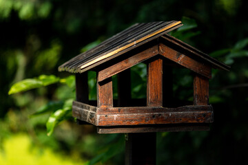 Obraz na płótnie Canvas wooden bird house on a tree