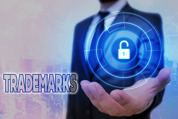Handwriting text Trademarks. Conceptual photo legally reserved to the exclusive use of the owner as...