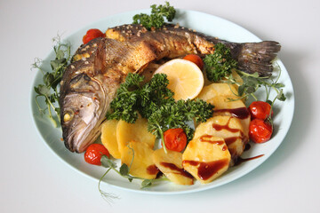 Pan-fried fish and potatoes.Texture or background