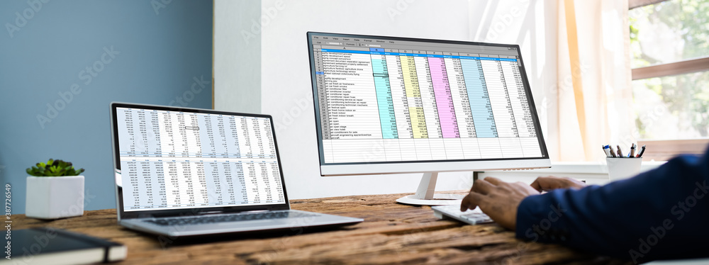 Poster african analyst working with spreadsheet data