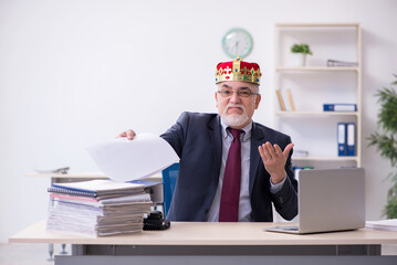 Old king businessman employee at workplace