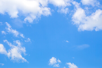 Naklejka na ściany i meble White clouds on the blue sky for background.