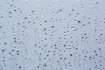 close up rain drops on glass.