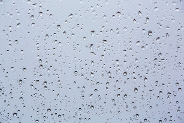 close up rain drops on glass.