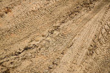traces of cars in the mud