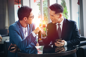 Executive business people greeting and meeting with partner or friends, alcohol drink hang out party and smile cheers together after work