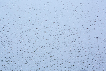 close up rain drops on glass.