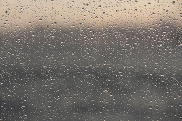 close up rain drops on glass.