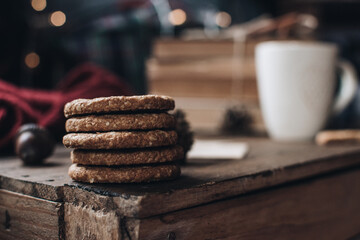 Scandinavian hygge styled Christmas composition. Cozy winter homely scene with cookies. Santa Claus working place. Flatlay. Home decor.