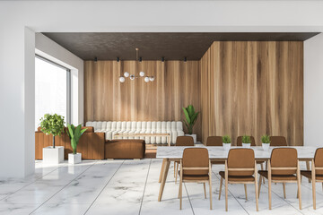 White and wooden dining room with sofa