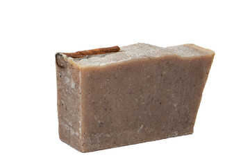 Bars of soap with cinnamon on isolated white background
