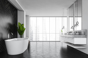 Dark grey bathroom in open space with black floor and large windows, pendant lamps