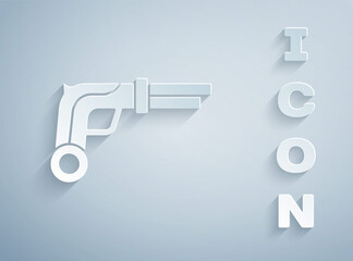 Paper cut Vintage pistols icon isolated on grey background. Ancient weapon. Paper art style. Vector.