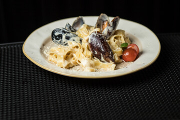 Close up pasta with clams and fresh mussels