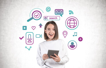 Excited teen girl with tablet, social media