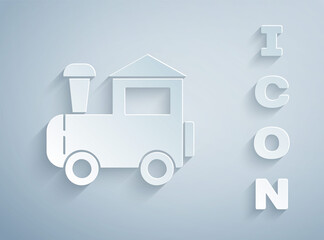 Paper cut Toy train icon isolated on grey background. Paper art style. Vector.