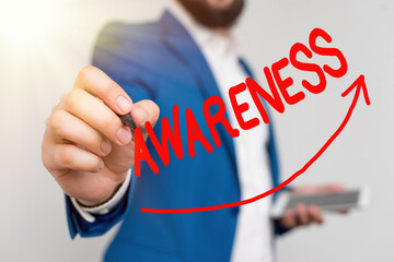 Writing note showing Awareness. Business concept for quality or state of being aware of knowledge...