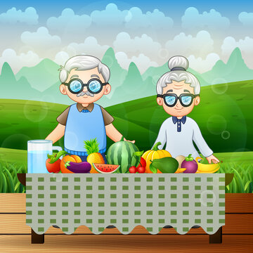 Happy grandparents and different fresh fruits at nature background