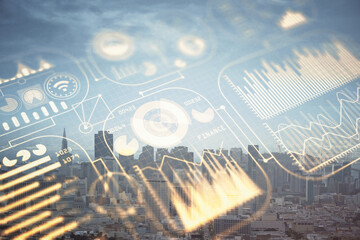 Double exposure of technology theme hologram and cityscape background. Concept of Hightech.