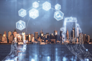 Double exposure of technology theme hologram and cityscape background. Concept of Hightech.