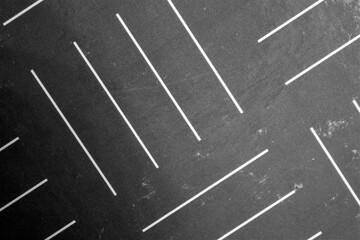 evocative black and white texture of drawing with oblique lines parallel to each other