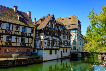 Fototapeta na wymiar Fachwerk houses on the embankment of Ill river in Strasbourg, France, Alsace.