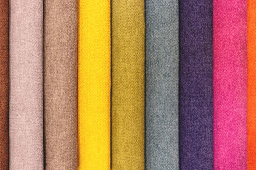 Vertically arranged multi-colored tissue samples as background, texture, pattern.