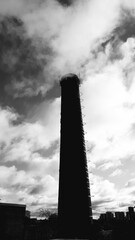 black and white image of the tall brick chimney