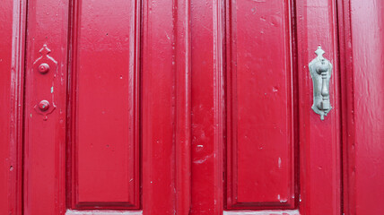 Fototapeta premium colored wooden doors with metal knobs