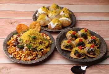 group of Bombay chat food includes  bhel-puri, sev-poori, dahipuri.