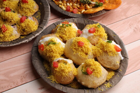 group of Bombay chat food includes  bhel-puri, sev-poori, dahipuri.