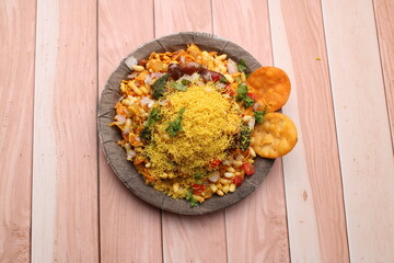 Bhelpuri Chaat/chat is a road side tasty food from India, served in a plate.