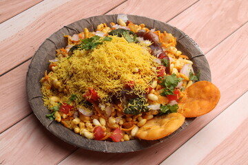 Bhelpuri Chaat/chat is a road side tasty food from India, served in a plate.