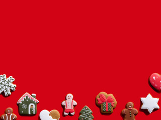 Red Xmas commercial background. Festive cookie pattern. Winter holidays party ornament. Different gingerbread biscuit collection minimal composition isolated on bright copy space.