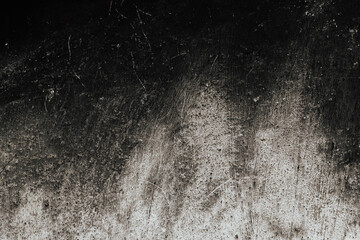 Old concrete vintage wall. Scratched black and grey texture. 