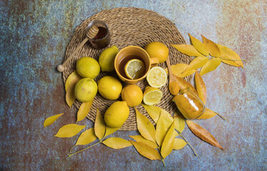 Still life of lemons, honey, turmeric and herbal tea