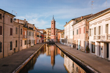 Fototapeta na wymiar Comacchio, Ferrara / Italy - August 2020: Civic tower of Comacchio