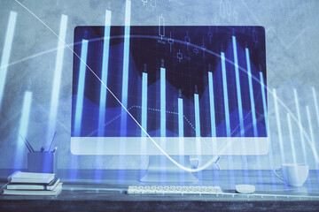 Stock market graph on background with desk and personal computer. Double exposure. Concept of financial analysis.