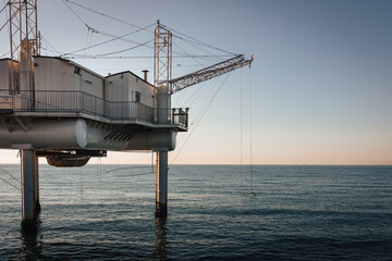 Marina di Ravenna, Ravenna / Italy - August 2020: Fishing huts of the Zaccagnini pier