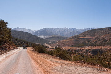 Off road 4x4 vehicle in dry mountainous desert area  © Liam M