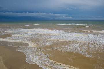 Beautiful stormy sea, coast and sky with clouds