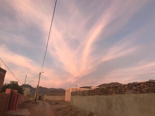 Pink sky,Evening Dusk cloud on Sunset,idyllic nature cloud,dramatic sunlight with majestic peaceful sky in summer season in tafraout, Morocco.

