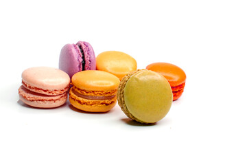 Macaroons isolated on the white background. Homemade french style colorful macaroons.Concept of sweet food and desserts.