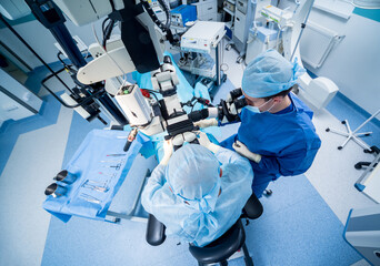 A team of surgeons performing brain surgery to remove a tumor.