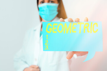 Conceptual hand writing showing Geometric. Concept meaning using straight or curved lines in designs and many more. Laboratory technician featuring paper accessories smartphone