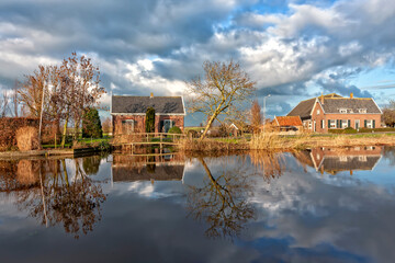Obraz premium The Alblasserwaard is a polder in the province of South Holland, Netherlands. It is mainly known for the windmills of Kinderdijk, but there is more.