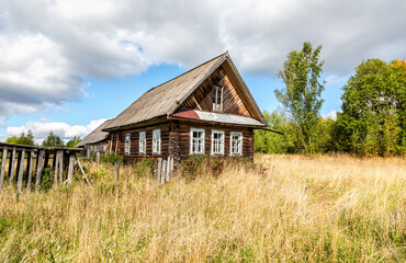 Old rural wooden house in abandoned russian village